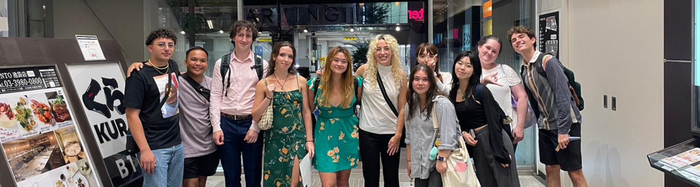 Group of students posing next to each other