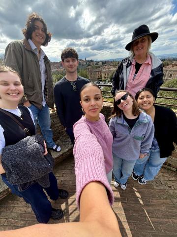 University students taking a .5 selfie in Siena, Italy